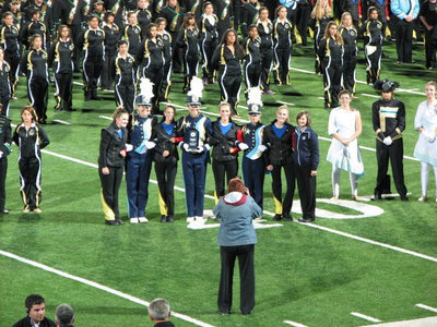 Image: Drum Majors and Color Guard captains of the Sky View Marching Band accept the 7th place trophy for the band’s Finals performance in the 2011 Bands of America Championships.