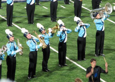 Image: Members of the Sky View Marching Band hornline put their all into the final note of their 2011 “Rock Me Blue” show during the Red Rocks Invitational.