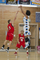 Image: Jalen Moore shoots a three. Moore finished ...