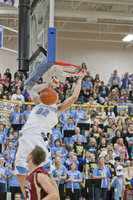 Image: Slam!  Casey Oliverson (32) takes it to ...