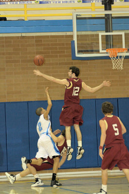 Image: Grayson Moore (#2) getting fouled on a lay-up