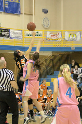 Image: Linsey Walker (#44) jumps for the tipoff