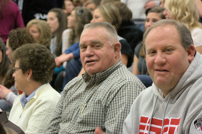 Image: Mr. &amp; Mrs. Evan Hall plus their son Mike enjoy the game