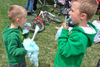 Image: A little messy — Cougar, 4-years-old today, and his older brother Maverick Christensen (6-years-old) making a happy mess with cotton candy.