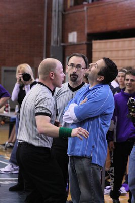 Image: Bagley argues call — Assistant Coach Bardet Bagley disputes a call at sectional tournament