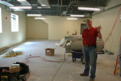 Image: Blake Knight — Blake Knight, President of Onyx Construction, showing the new city hall.
