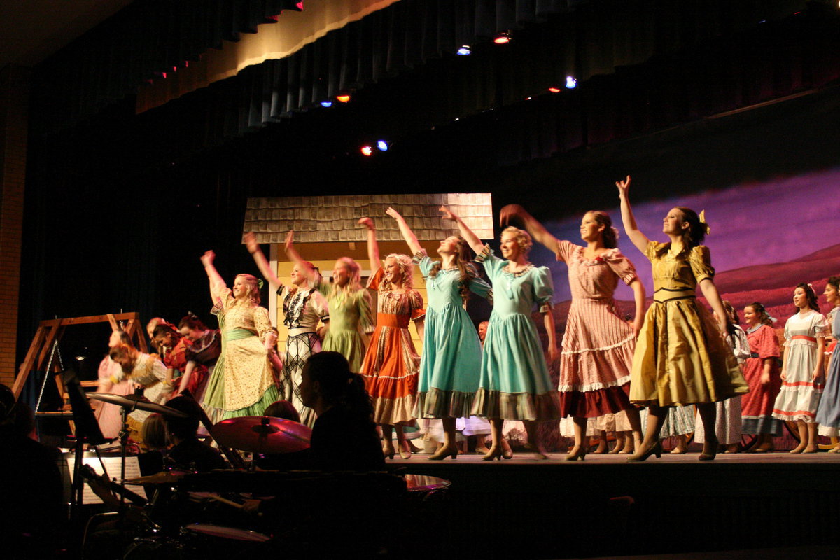 Image: Girls bow — The female cast take their bows at the end of Oklahoma!