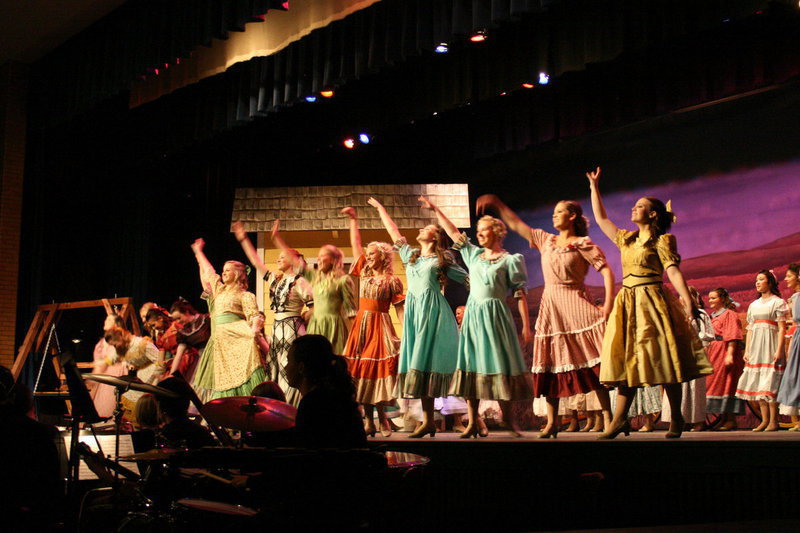 Image: Girls bow — The female cast take their bows at the end of Oklahoma!