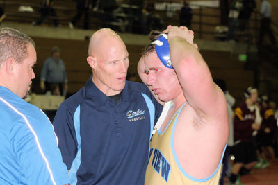 Image: Coaches Hardy / Wright — Coaches Paul Hardy and Kyle Wright instruct Jordan Jarrett