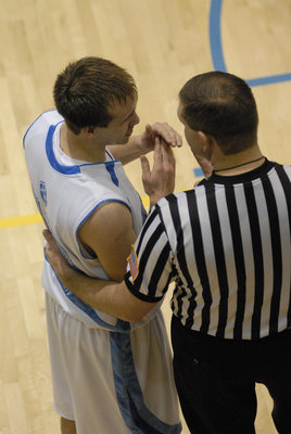 Image: Discussion — Kyler Carlsen talks to a ref after referees separated Skyview and Logan players