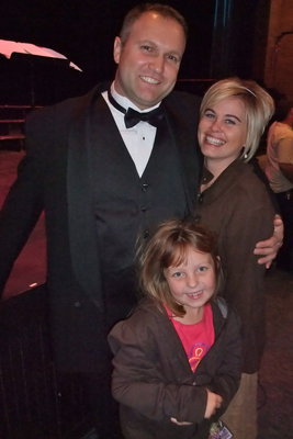 Image: Caldwell family — Choir director John Caldwell with his wife, Jennifer, and daughter, Quincy, after the performance.