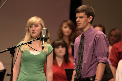 Image: Melissa Bingham and Tanner Daines sing a duet on “Defying Gravity” by Schwartz &amp; Emerson