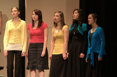 Image: Women’s Choir  members join the concert choir a number.